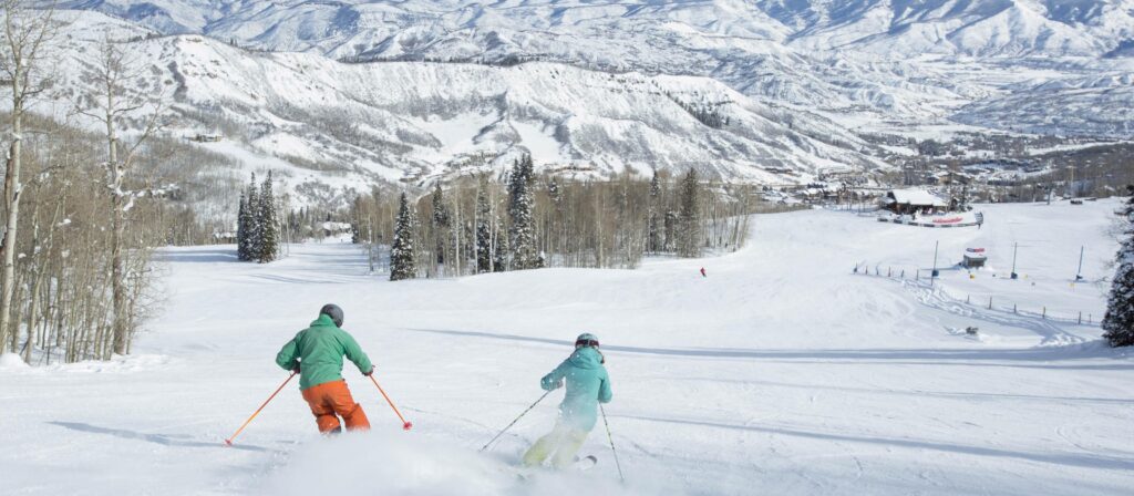 Snow-covered mountains and ski slopes in Aspen, Colorado - a top winter destination for January 2025.