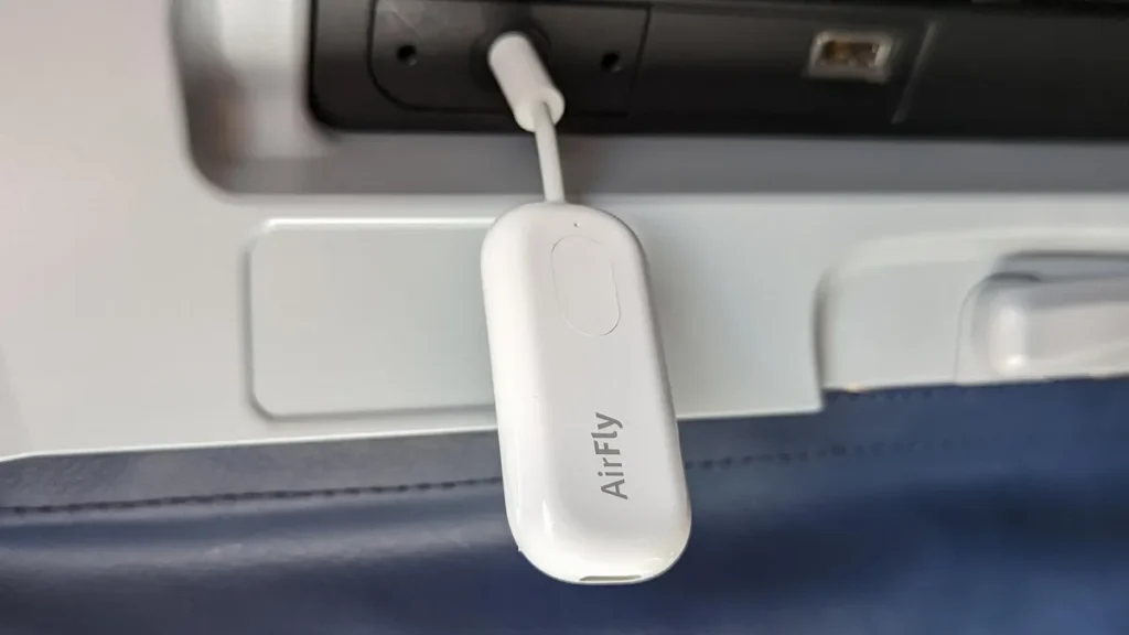 Twelve South AirFly Pro Bluetooth adapter, connecting wireless headphones to in-flight entertainment systems.