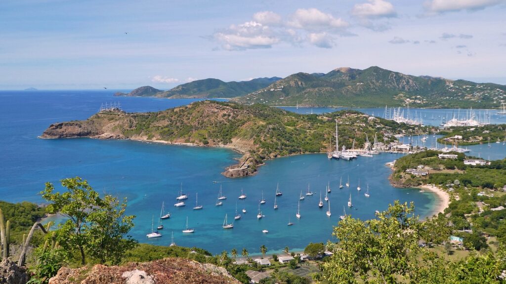 aerial view of Half Moon Bay in Antigua, a picturesque beach known for its serene waters and natural beauty