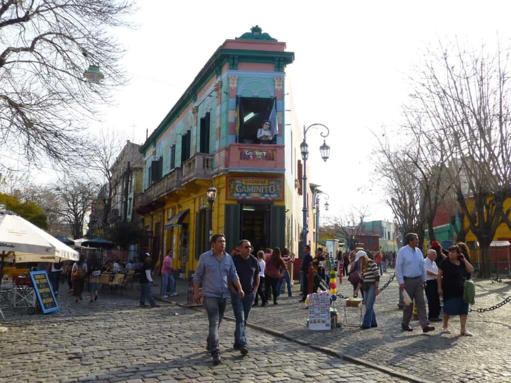 The colorful neighborhood of La Boca in Buenos Aires, known for tango and springtime vibrance in November.