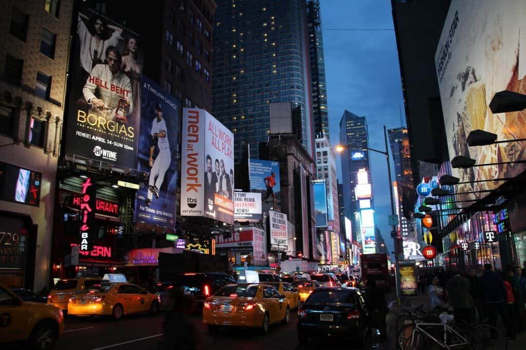 View of Time's square in New York City during fall, with vibrant night life activites.