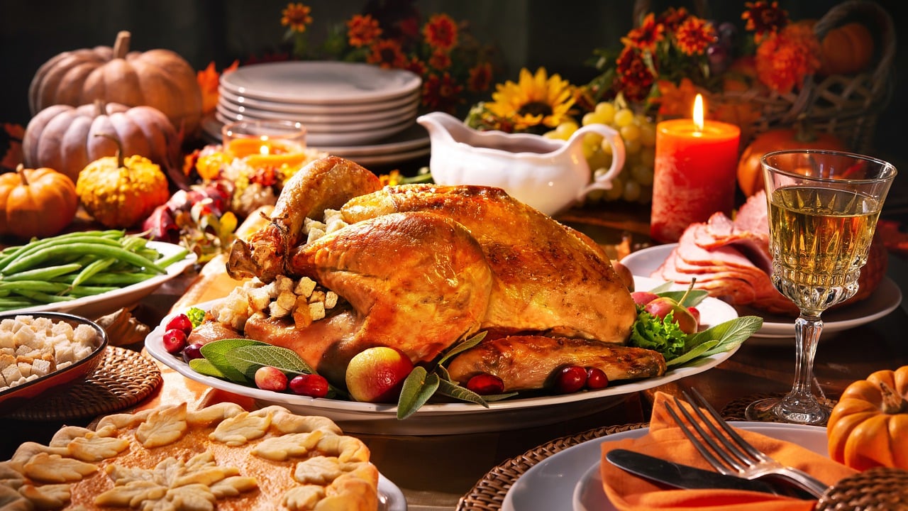 A beautifully set Thanksgiving table at a top restaurant, showcasing one of the best restaurants open on Thanksgiving for the major cities of the US.