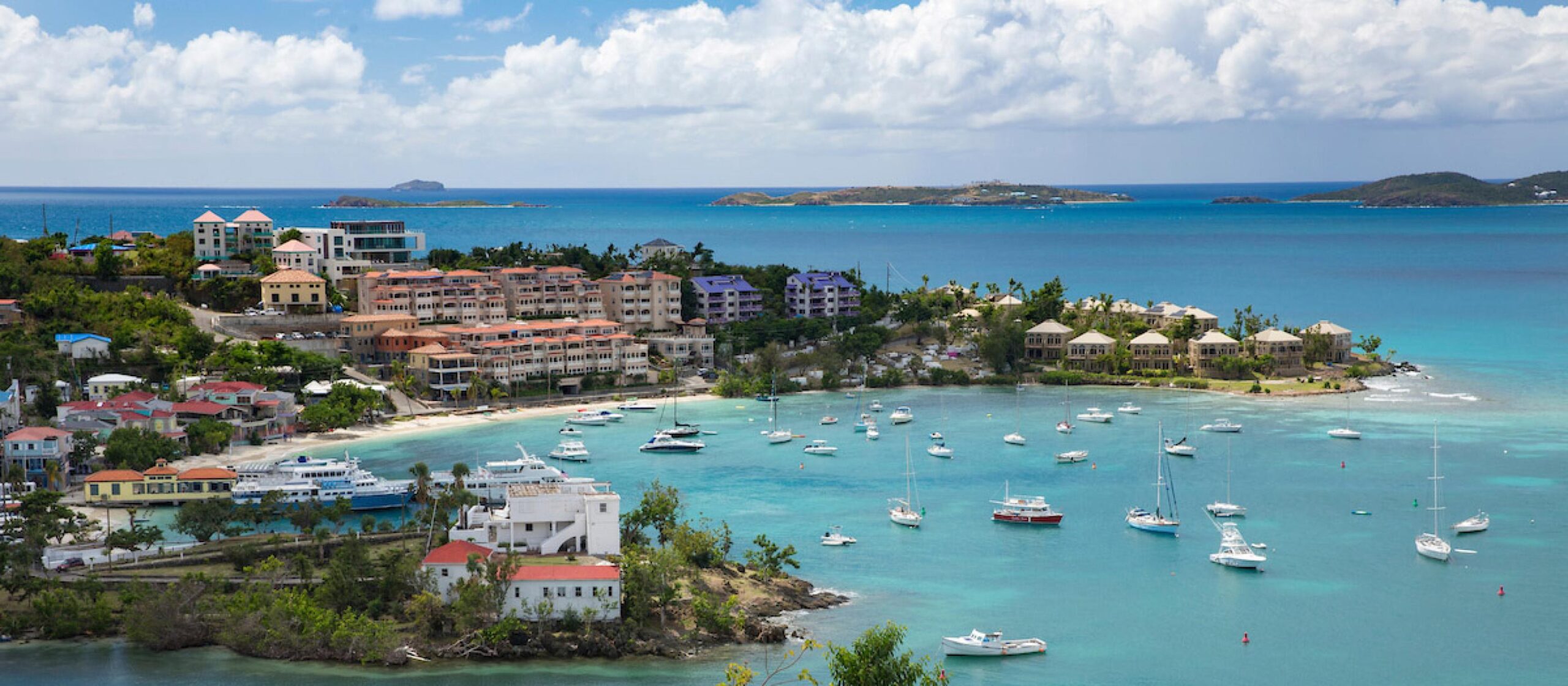 Stunning beach view of one of the 10 best places to visit in the US Virgin Islands in December 2025 with crystal-clear waters and white sand.