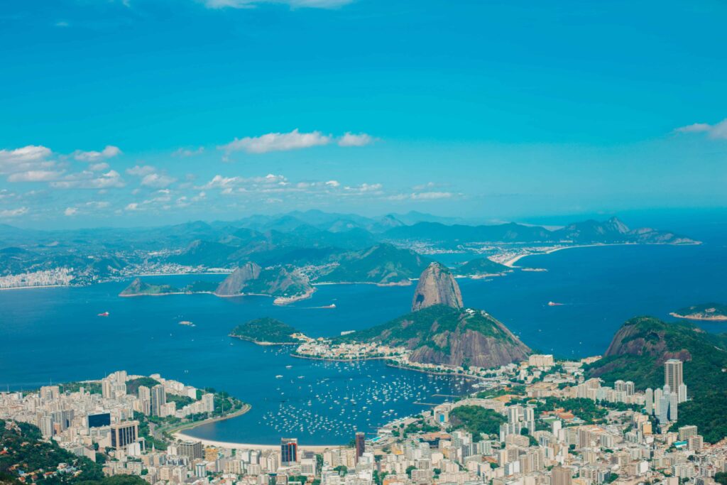 Panoramic view of Rio de Janeiro, Brazil, showcasing Sugarloaf Mountain and the sprawling city by the bay.