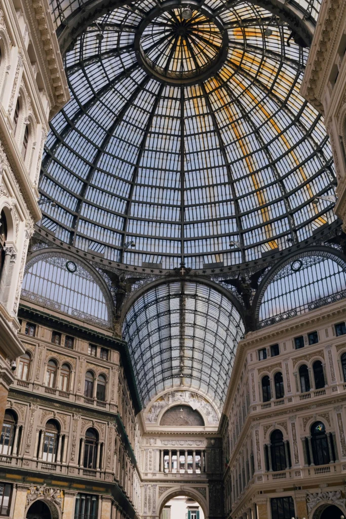 The intricate glass dome of Galleria Umberto I in Naples, Italy, with its elegant architectural details