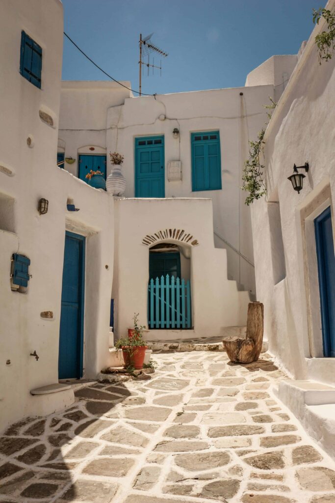 Charming streets of Naoussa Village in Paros, perfect for honeymooners seeking a romantic Greek island experience.