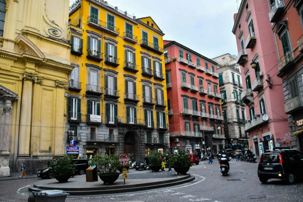 Brightly colored historic buildings in Naples, Italy, capturing the vibrant charm of the city's architecture