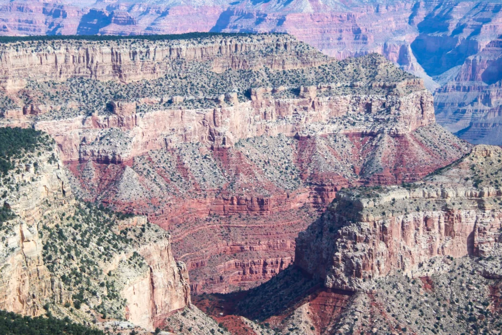 Close-up of intricate rock layers and formations in the Grand Canyon.