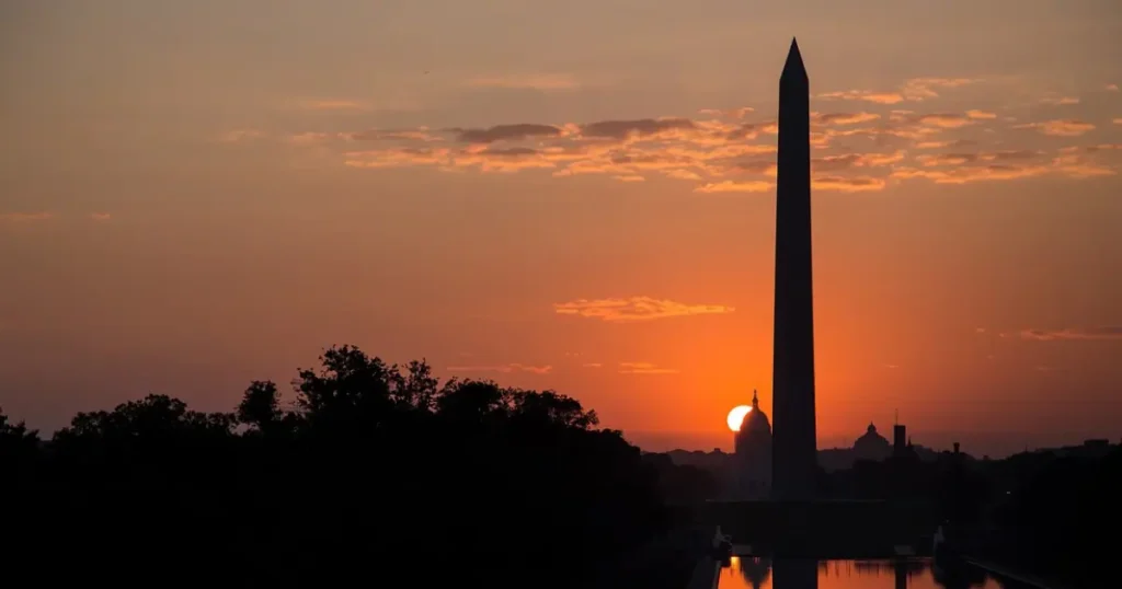 The Washington Monument during a vibrant sunset in Washington DC.