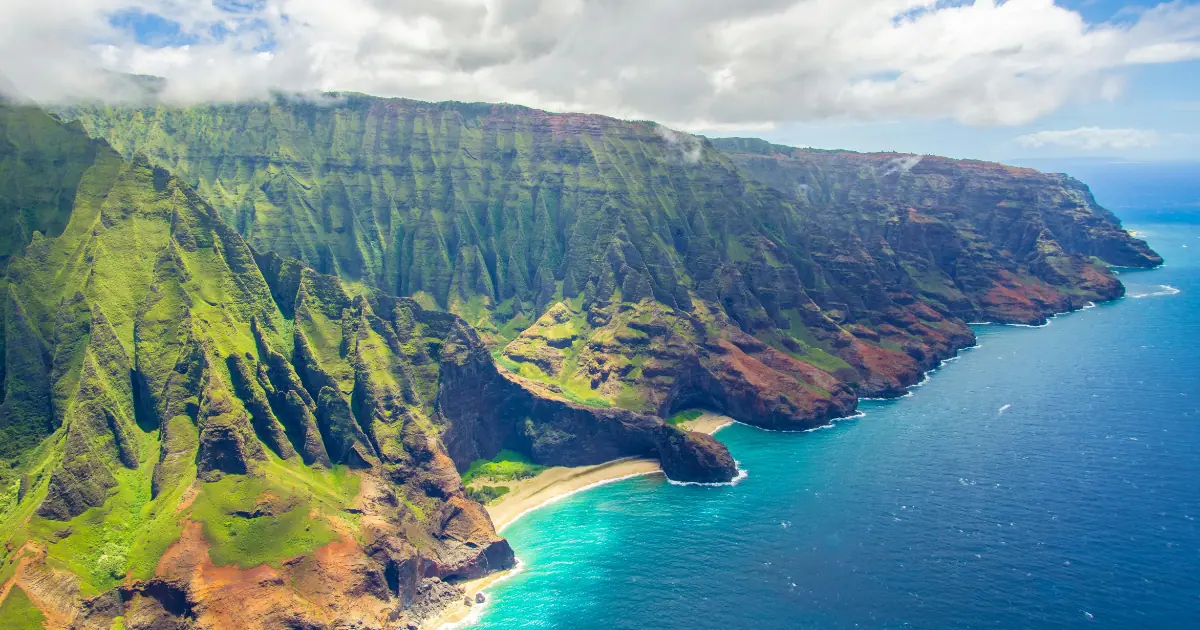 A breathtaking aerial view of the Na Pali Coast, one of the best things to do in Kauai.