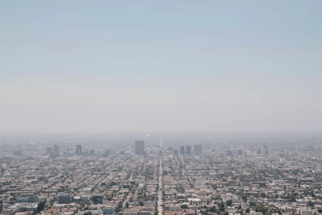 A panoramic aerial view of the Los Angeles cityscape stretching into the horizon.