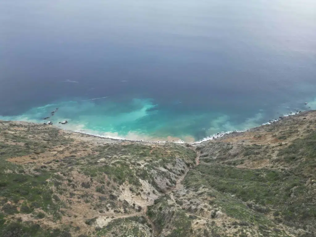 Aerial view of Catalina Island's rugged coastline and turquoise waters.