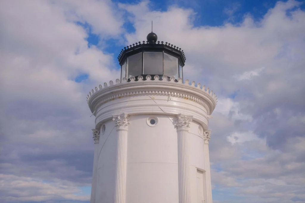 The iconic Bug Light lighthouse at Portland Harbor on a bright day.