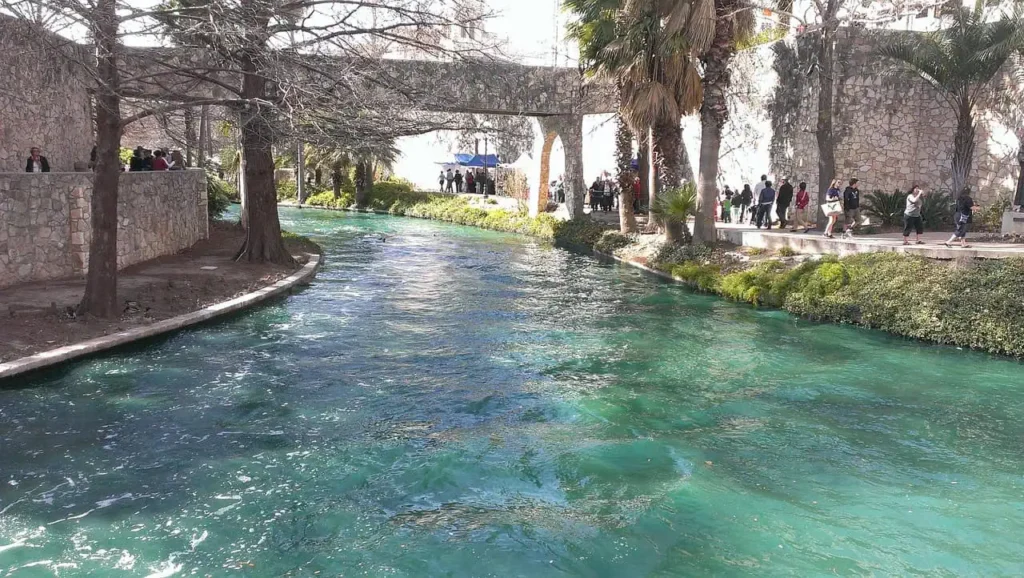 A scenic bridge over the San Antonio River, a romantic spot for couples.