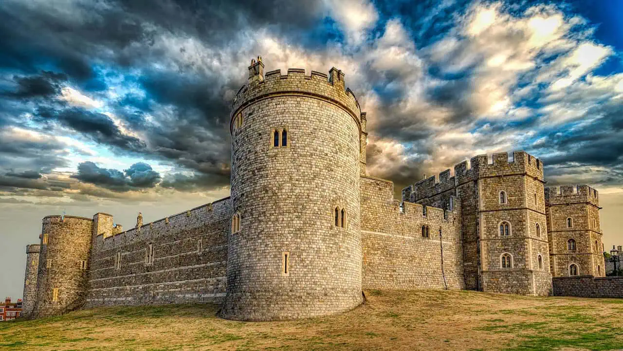 A stunning view of Windsor Castle during sunset, showcasing its iconic architecture and historic charm.