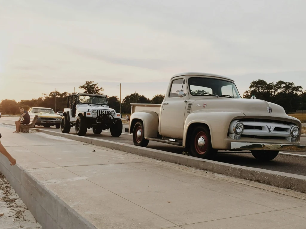 Vintage cars parked along the scenic Biloxi streets during the famous Cruisin’ the Coast event.