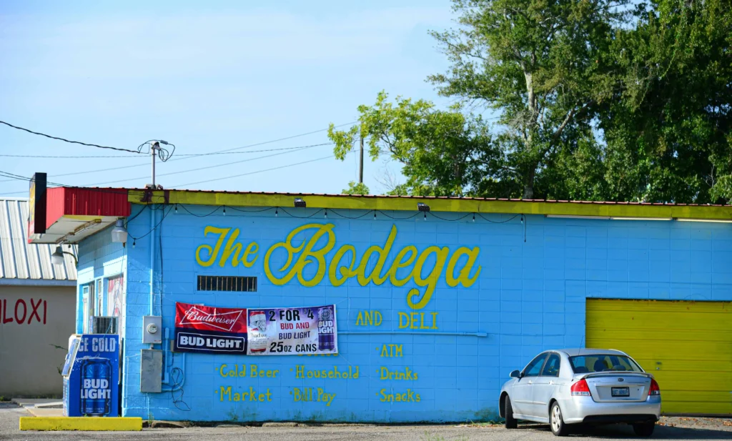 A colorful local bodega, offering drinks, snacks, and a charming Southern vibe.