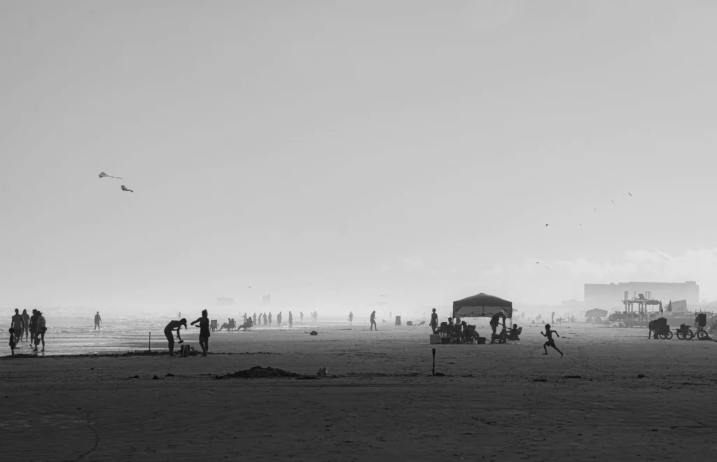 People enjoying the sandy shores of Padre Island National Seashore, one of the top things to do in Corpus Christi.