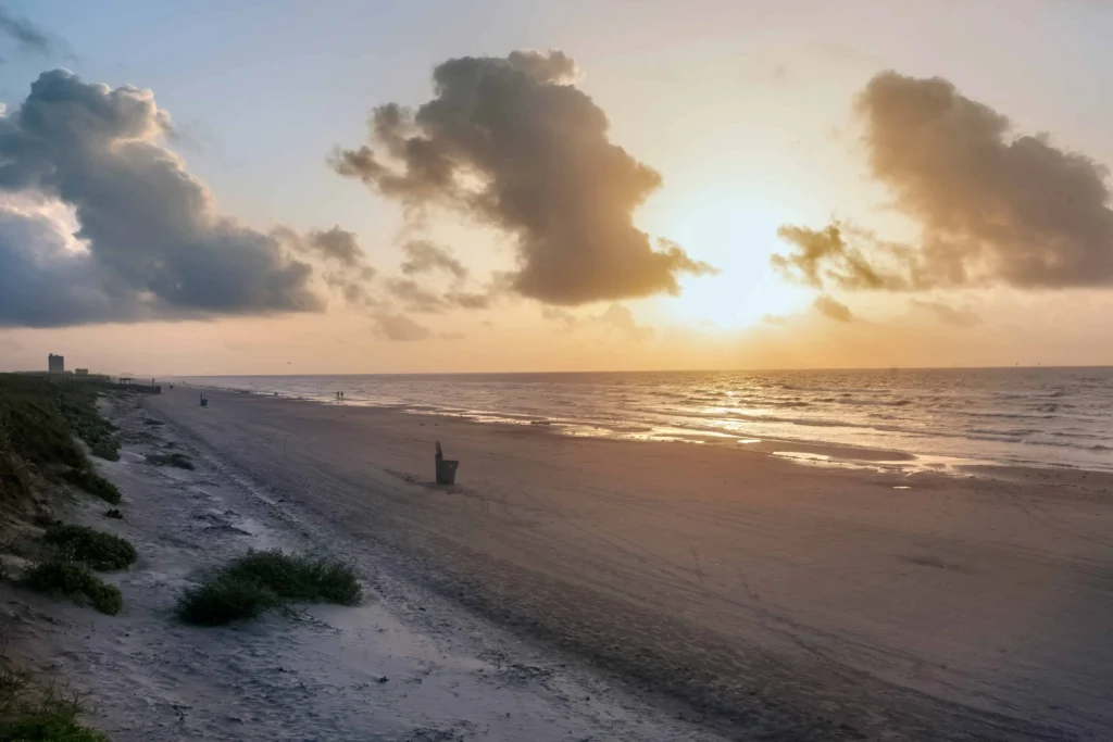 A beautiful sunset over the shoreline of North Beach in Corpus Christi, Texas.